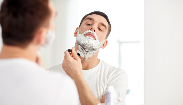 Man shaving his jaw
