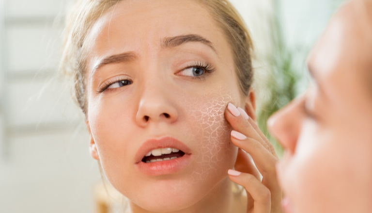 Woman touching her facial skin